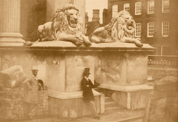 Builders by the Fitzwilliam Lions courtesty of the Fitzwilliam Museum