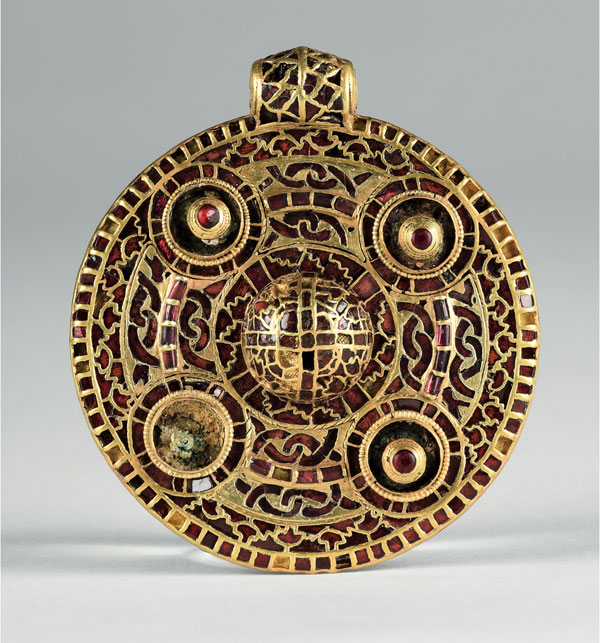 anglo saxon brooch with red inlay