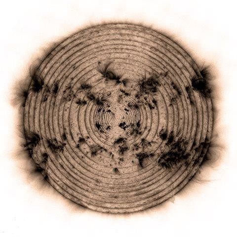 beige and black image of sun