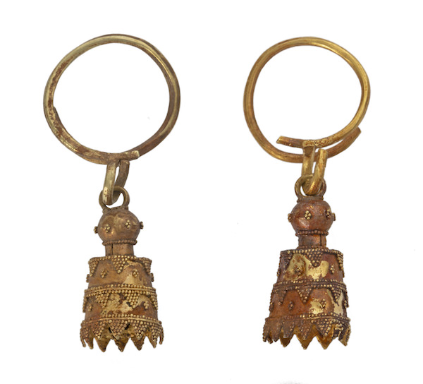 gold earrings in the style of decorated bell shapes suspended from gold loops