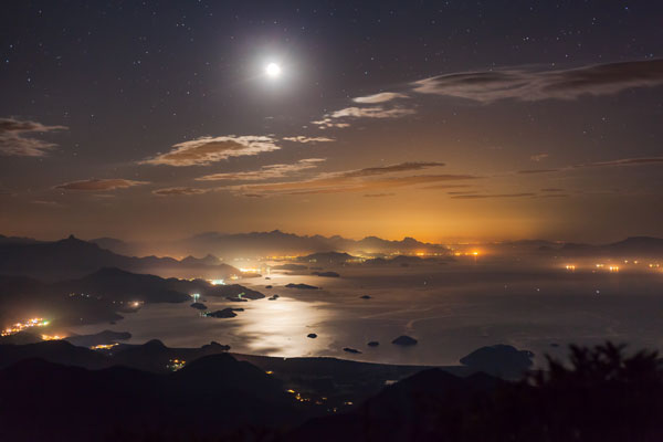 Moon Reflection © Rafael Defavari (Brazil) The brilliance of the Moon illuminates the night sky, and is reflected in the expansive water of the Paraty Bay, Brazil. Like all this month’s images, it is shortlisted for the Royal Observatory’s Astronomy Photographer of the Year
