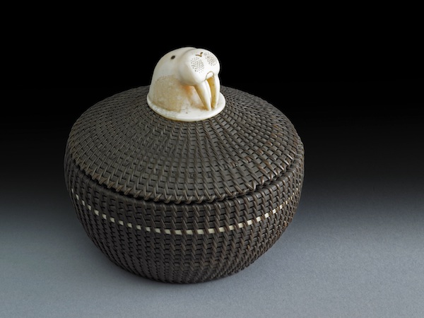 walrus head on woven basket