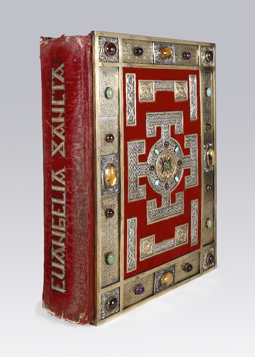 ornate red anglo saxon book inset with jewels
