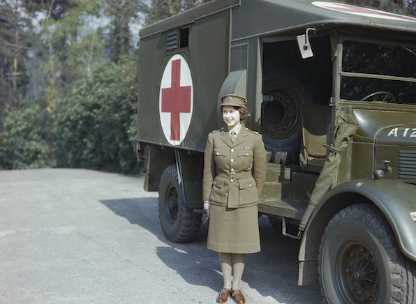 image of princess elizabeth in army uniform in front of a red cross truck