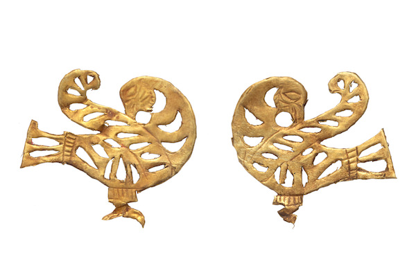 two dove headress plaques, identical but facing opposite ways and made from gold